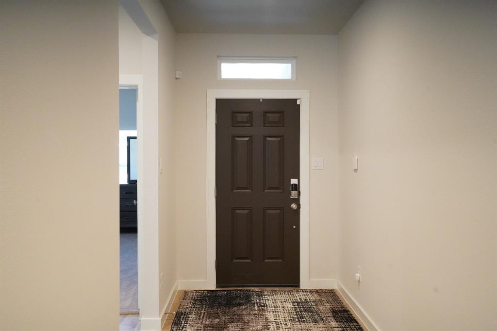 655 Scarlett Street Forney, TX 75126 - Photo 4 of 24 Entryway with baseboards