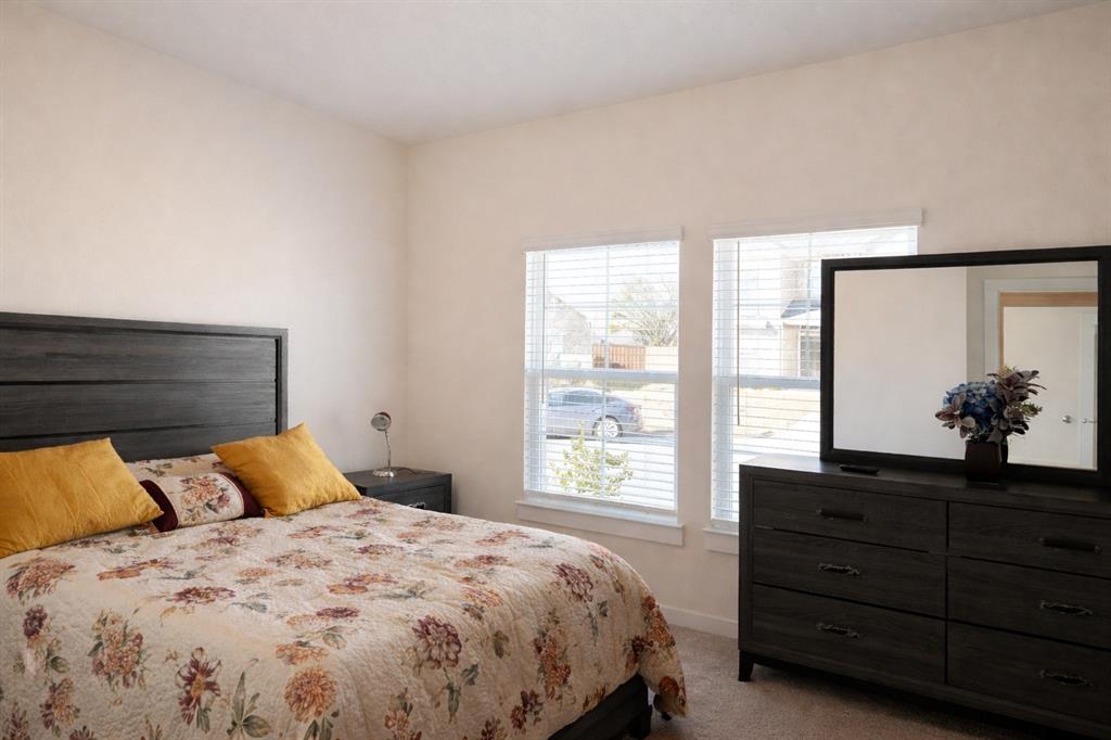 655 Scarlett Street Forney, TX 75126 - Photo 6 of 24 Carpeted bedroom featuring baseboards