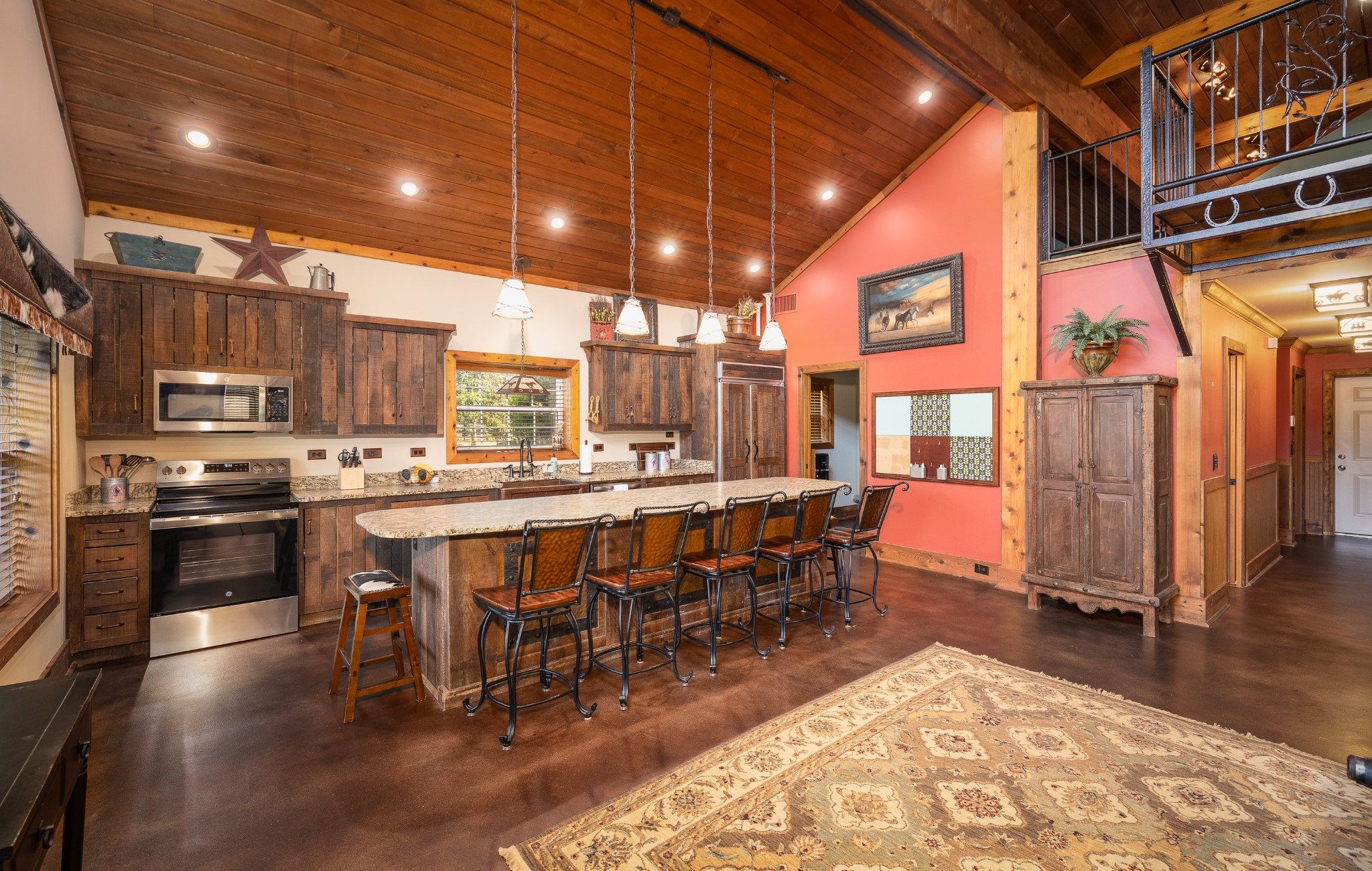 4750 Sharpsville Road Murfreesboro, TN 37130 - Photo 50 of 70 a dining hall with stainless steel appliances kitchen island granite countertop a table and chairs