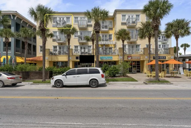 a view of a cafe with a outdoor seating
