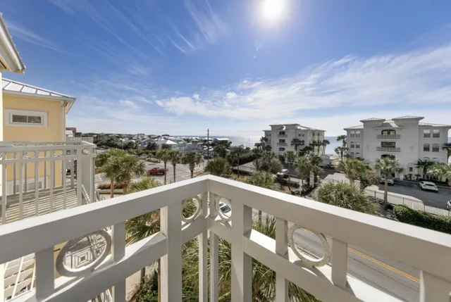 a view of a house with a yard and garden