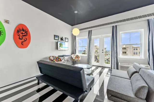 a bath room with a bath tub and a sink