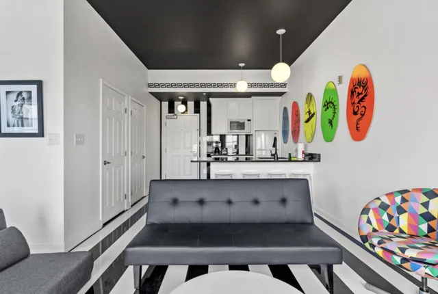 a view of a balcony with chairs