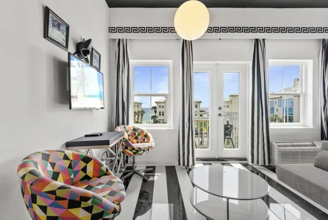 a view of a balcony with wooden floor and city view