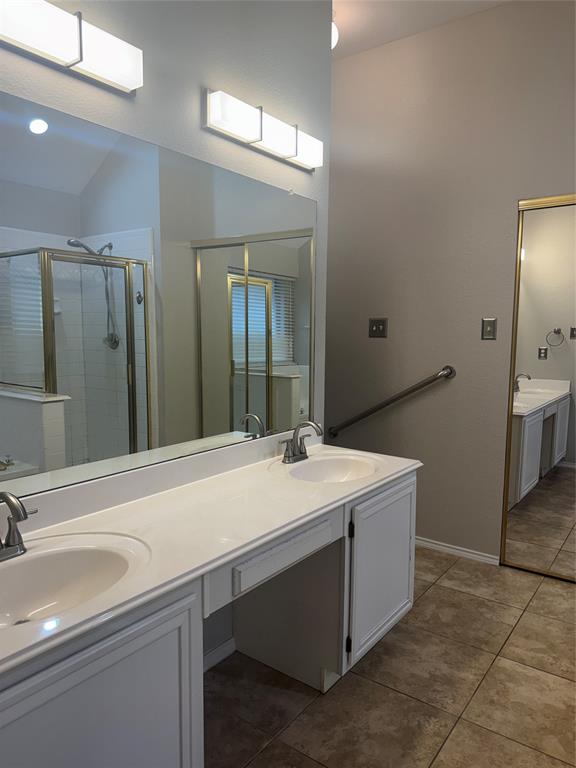 8109 Sebastian Frisco, TX 75035 - Photo 14 of 19 a room with a sink and a mirror