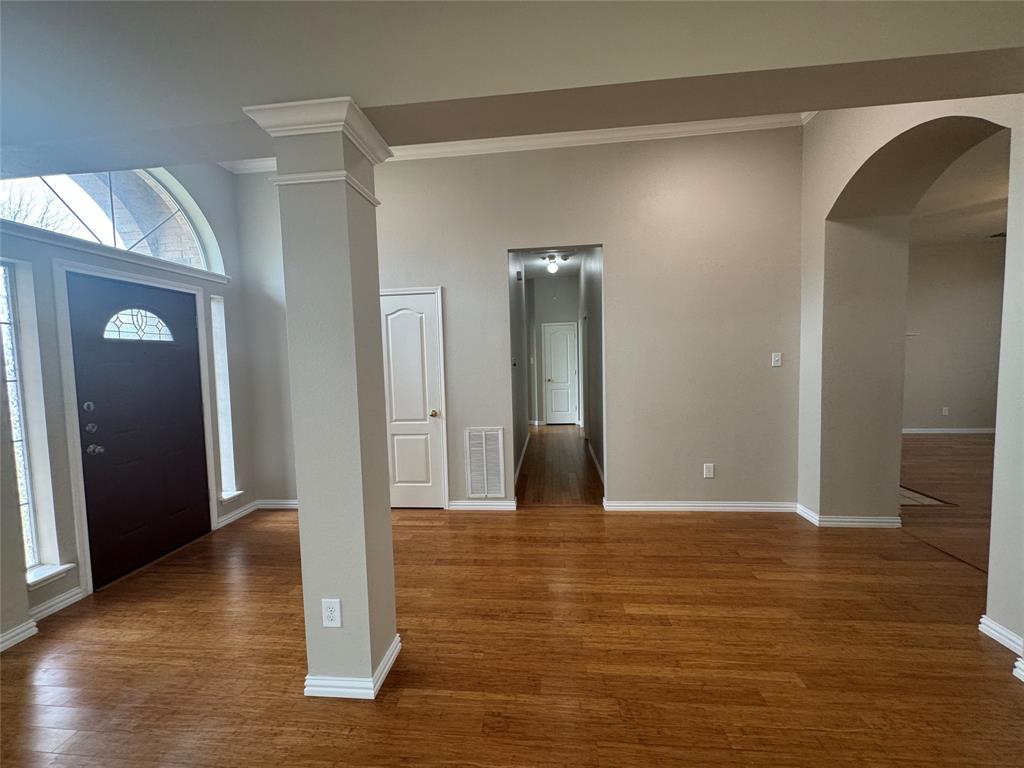 8109 Sebastian Frisco, TX 75035 - Photo 6 of 19 a view of livingroom with window and wooden floor