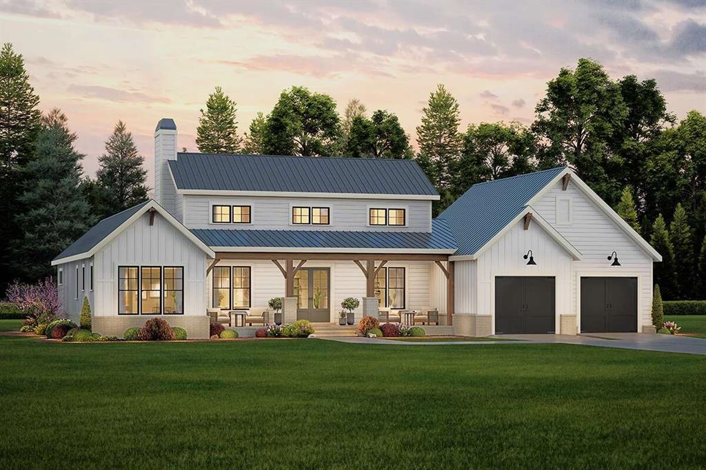 a view of a white house with a big yard and large trees