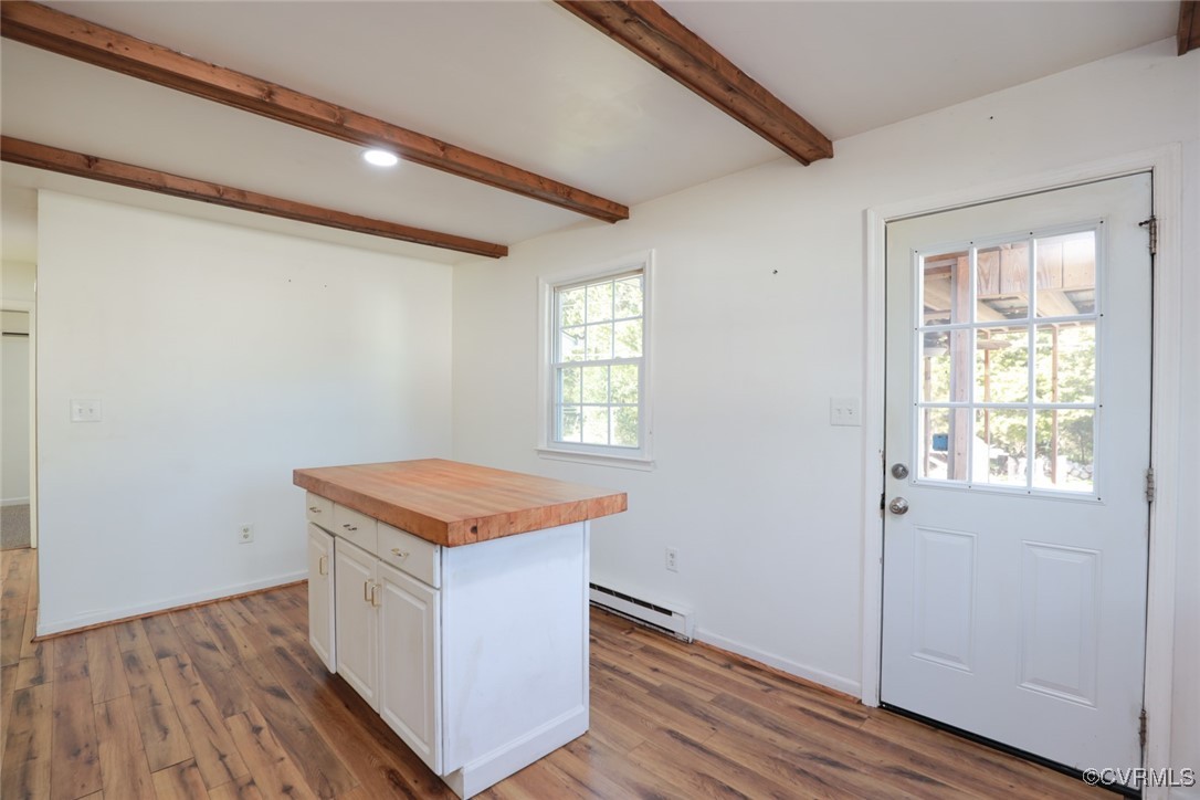 4210 Chesdin Boulevard Sutherland, VA 23885 - Photo 10 of 35 a room with wooden floor and window