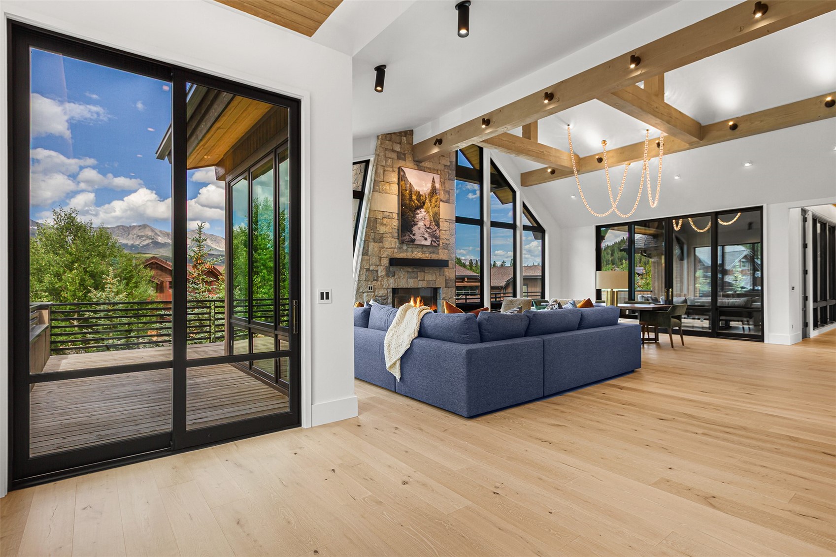 294 Gold Run Road Breckenridge, CO 80424 - Photo 17 of 49 a living room with furniture and a floor to ceiling window