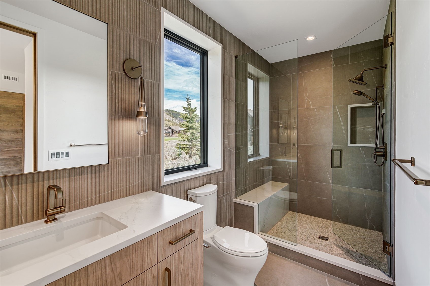 294 Gold Run Road Breckenridge, CO 80424 - Photo 35 of 49 a bathroom with a sink a toilet and shower