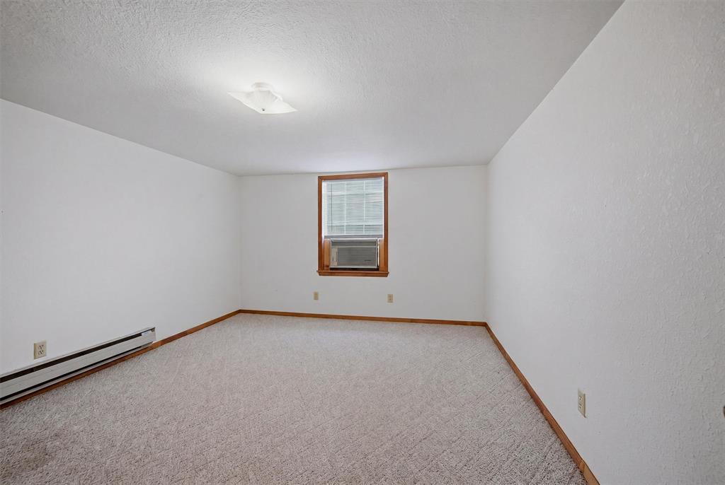 570 Ayres Road Bells, TX 75414 - Photo 31 of 40 an empty room with a window
