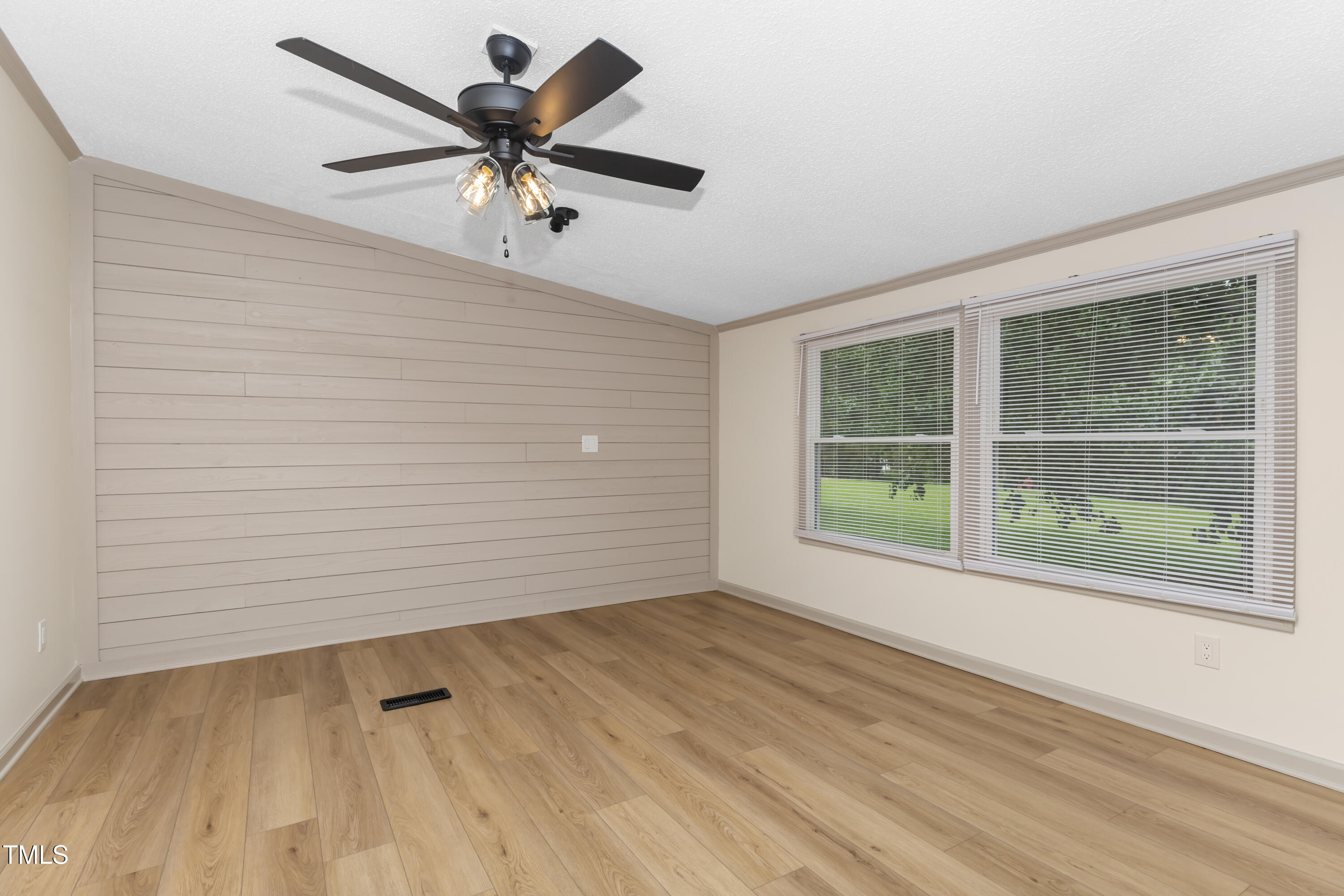 165 Dawn Road Benson, NC 27504 - Photo 15 of 30 a view of an empty room with a window