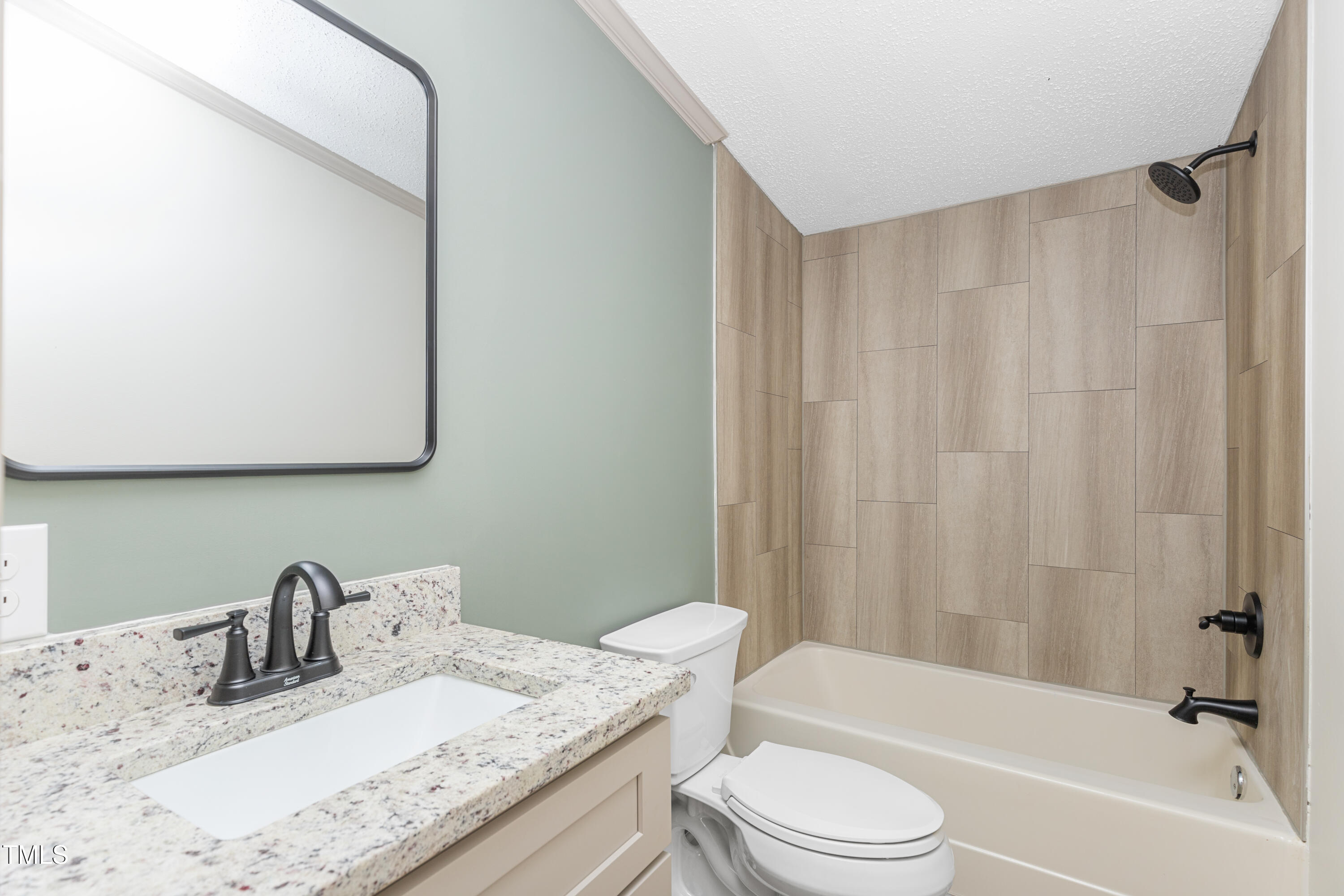 165 Dawn Road Benson, NC 27504 - Photo 25 of 30 a bathroom with a granite countertop sink toilet and mirror