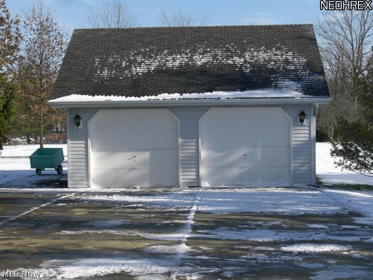 2909 Station Road Medina, OH 44256 - Photo 3 of 15 EXTRA 2 CAR INSULATED GARAGE WITH OVERHEAD STORAGE AREA.