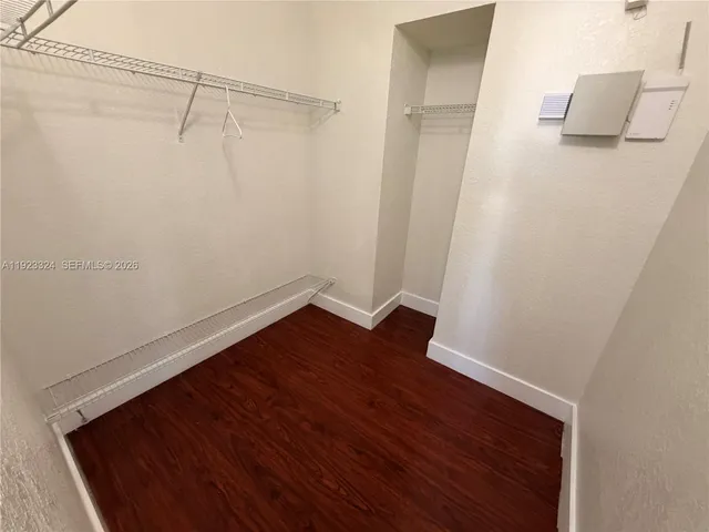 a view of small space with wooden floor