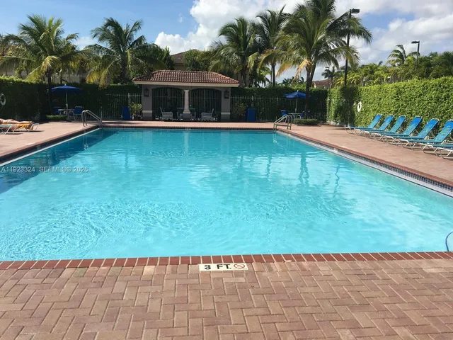 a view of a house with swimming pool