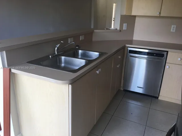 a close view of sink and a window