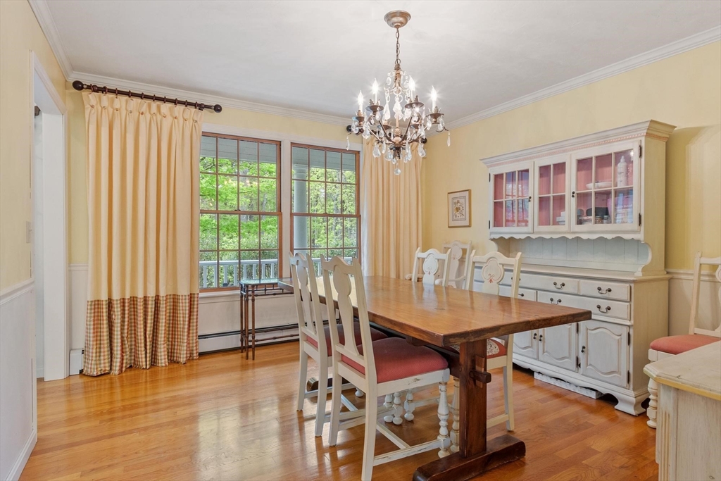 94 Turner Road Townsend, MA 01469 - Photo 5 of 42 a view of a dining room with furniture and chandelier