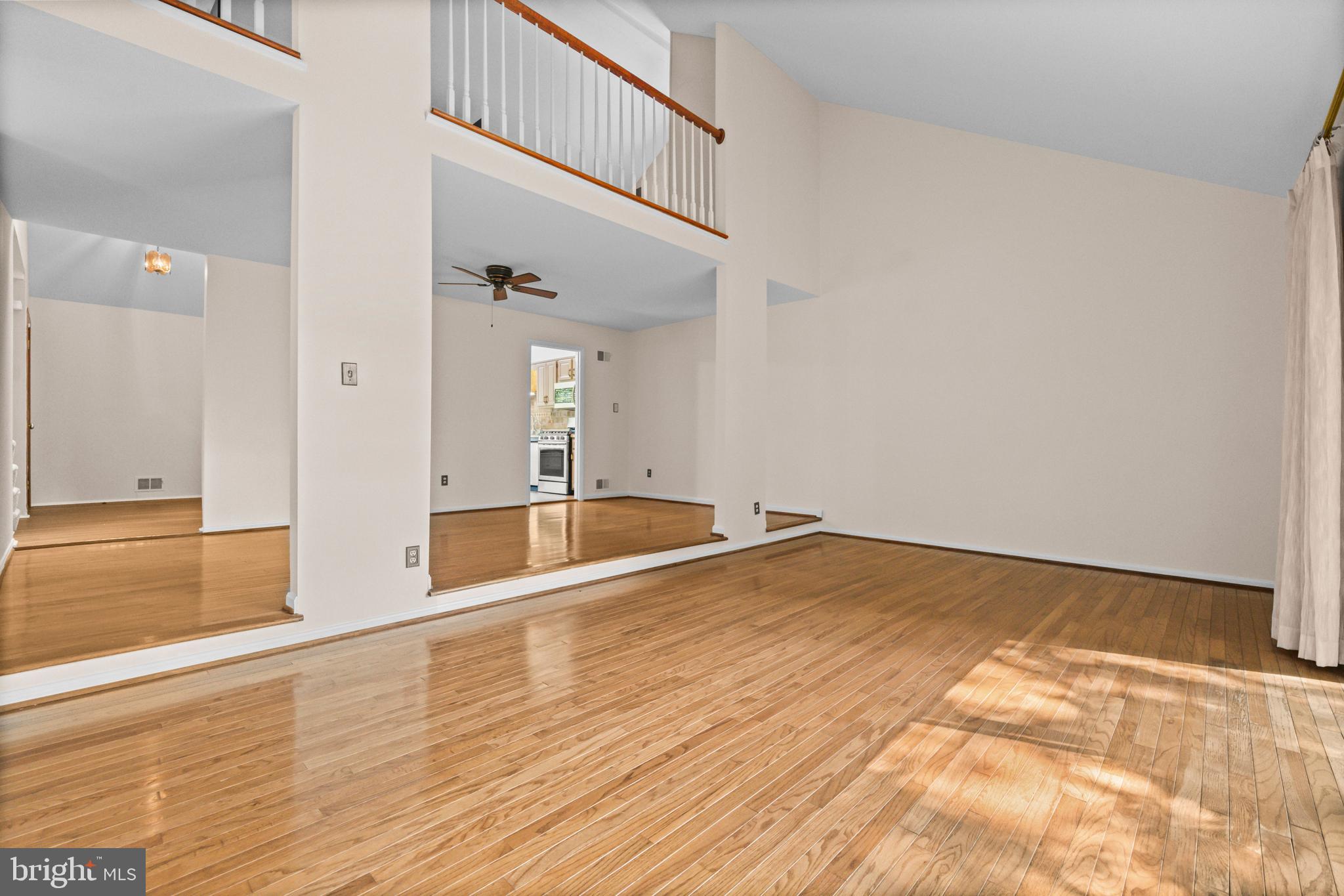 1413 Green Run Lane Reston, VA 20190 - Photo 15 of 50 a view of empty room with wooden floor