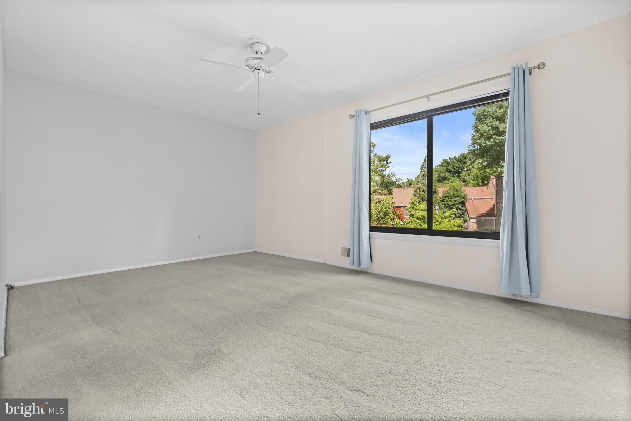 1413 Green Run Lane Reston, VA 20190 - Photo 21 of 50 a view of an empty room with a window