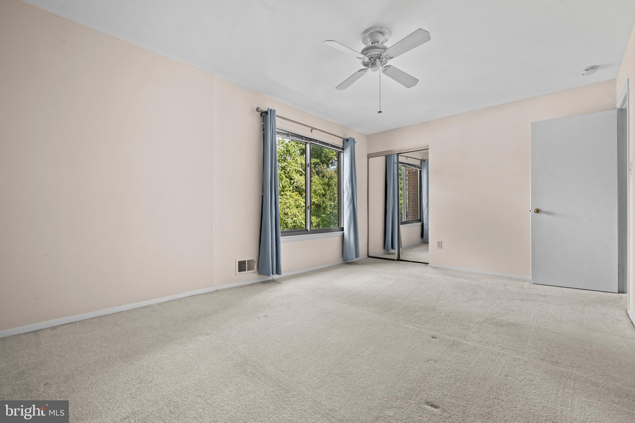 1413 Green Run Lane Reston, VA 20190 - Photo 22 of 50 a view of an empty room with a window