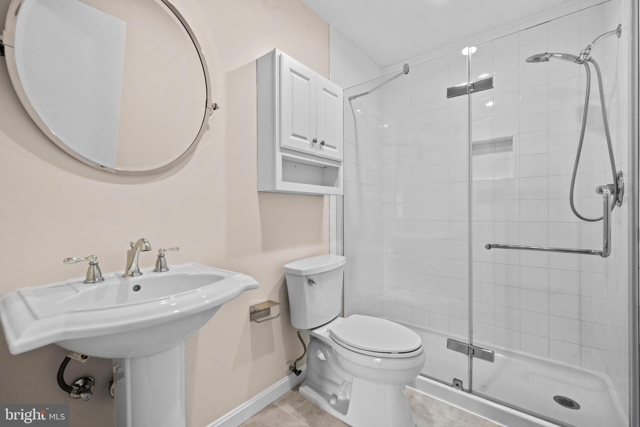 1413 Green Run Lane Reston, VA 20190 - Photo 26 of 50 a bathroom with a sink a toilet and shower