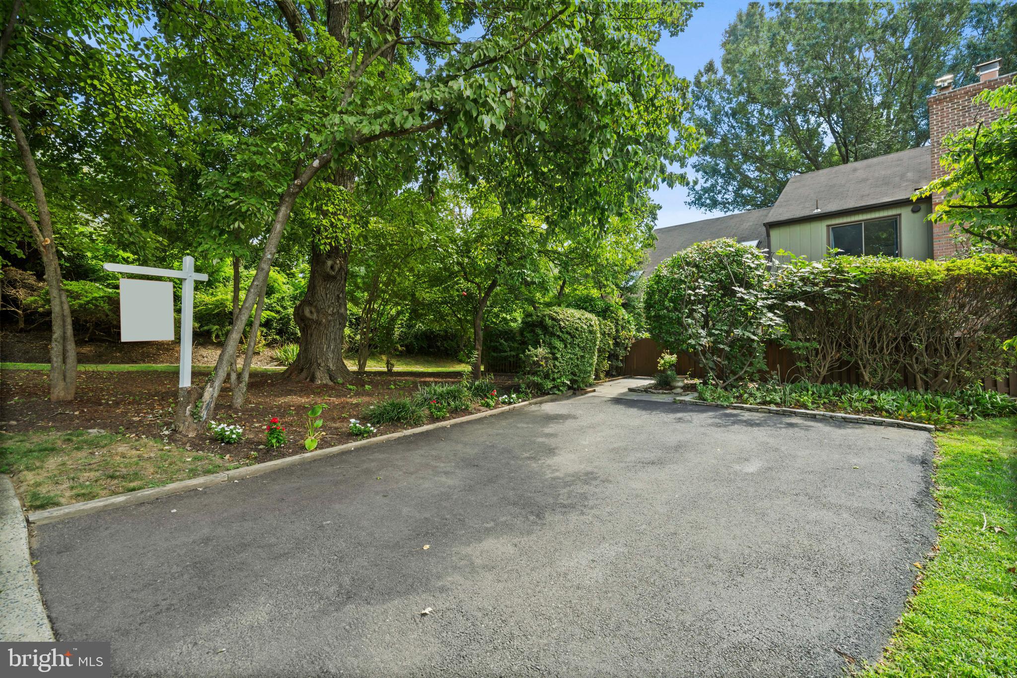 1413 Green Run Lane Reston, VA 20190 - Photo 39 of 50 a view of a house with backyard and trees