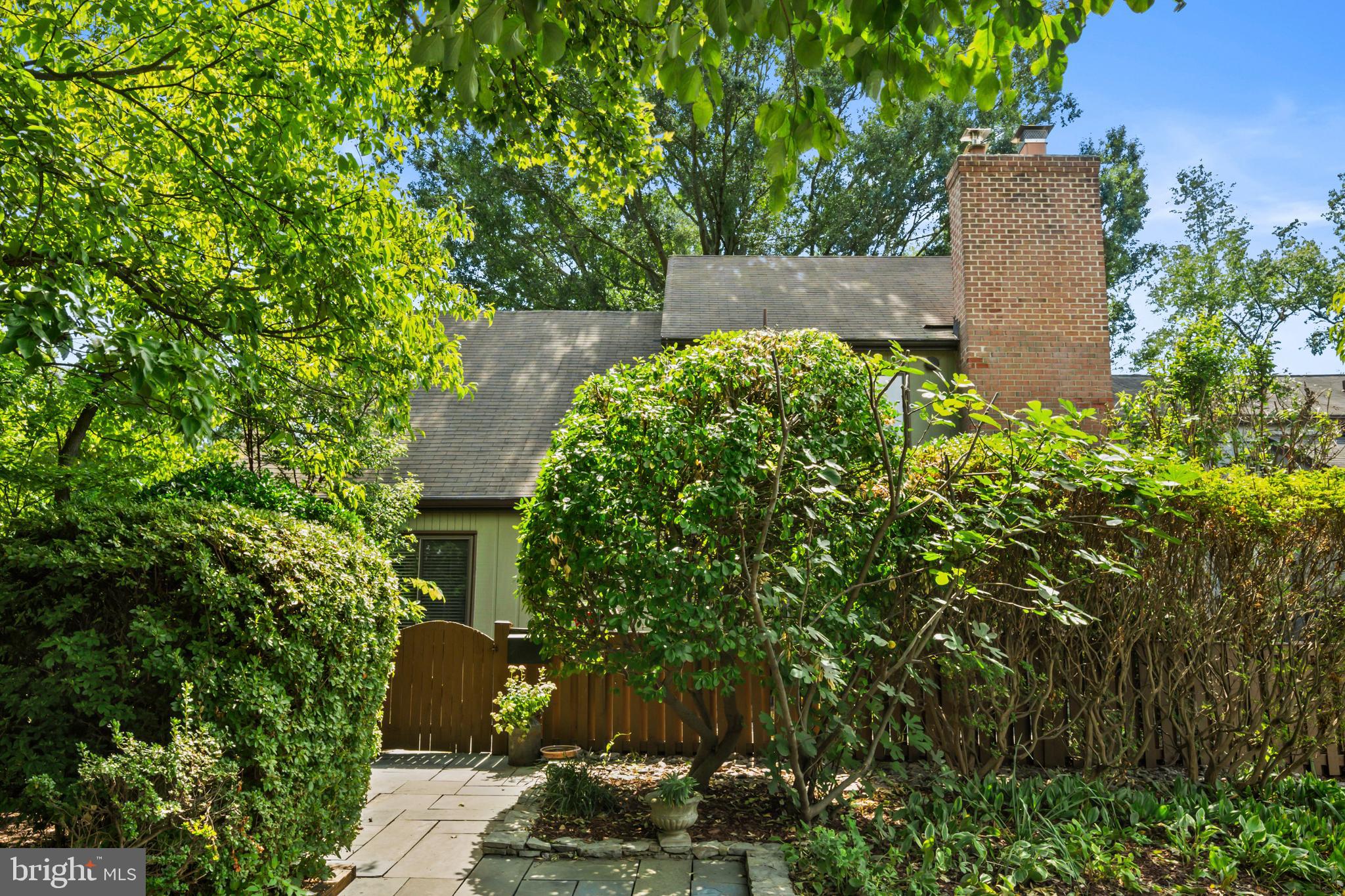 1413 Green Run Lane Reston, VA 20190 - Photo 40 of 50 an aerial view of a house with a yard and garden