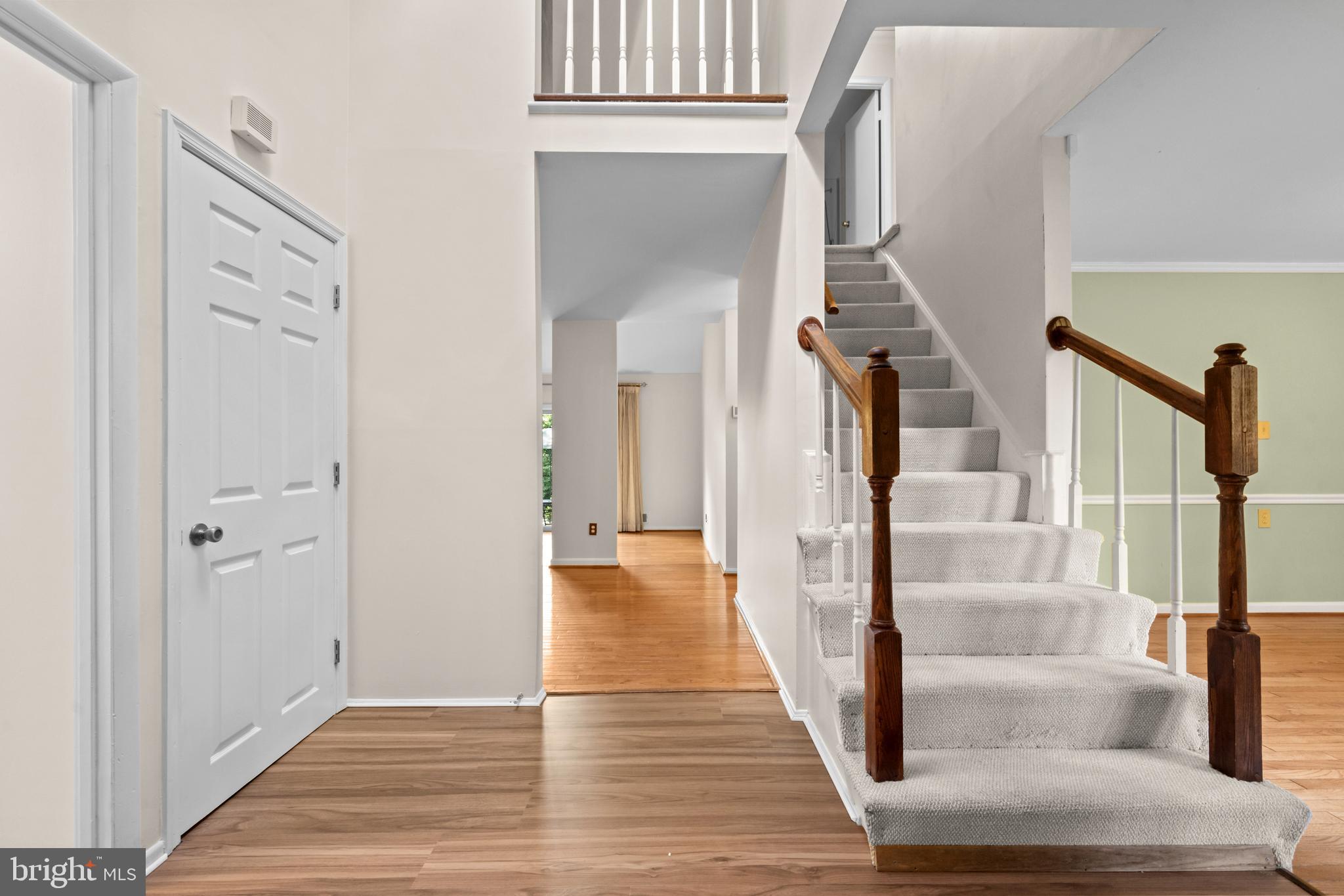 1413 Green Run Lane Reston, VA 20190 - Photo 4 of 50 a view of entryway and hall with wooden floor