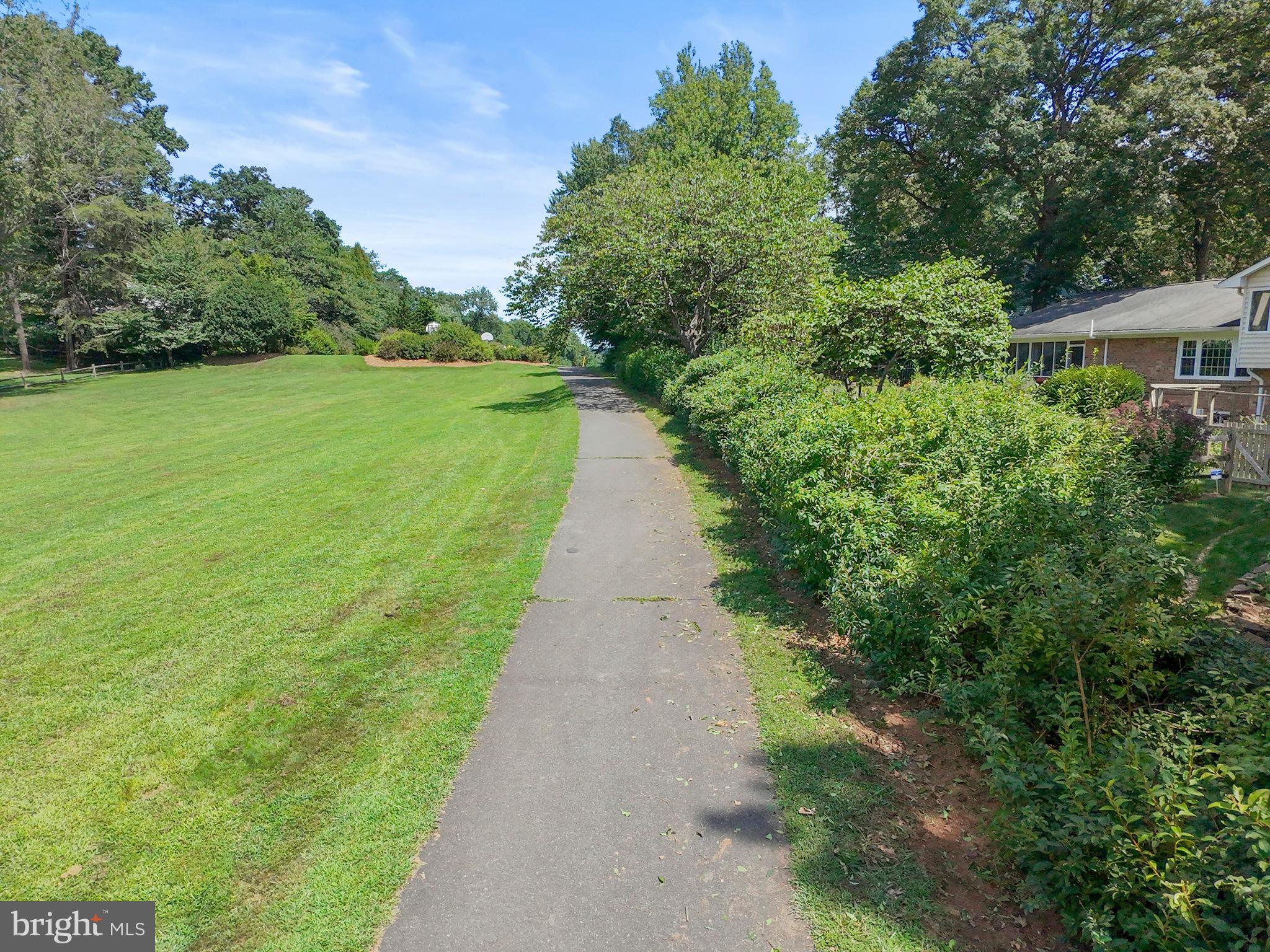 1413 Green Run Lane Reston, VA 20190 - Photo 44 of 50 a view of a pathway both side of garden