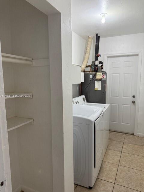 828 Fairway Drive Plantation, FL 33317 - Photo 12 of 14 a utility room with dryer and washer
