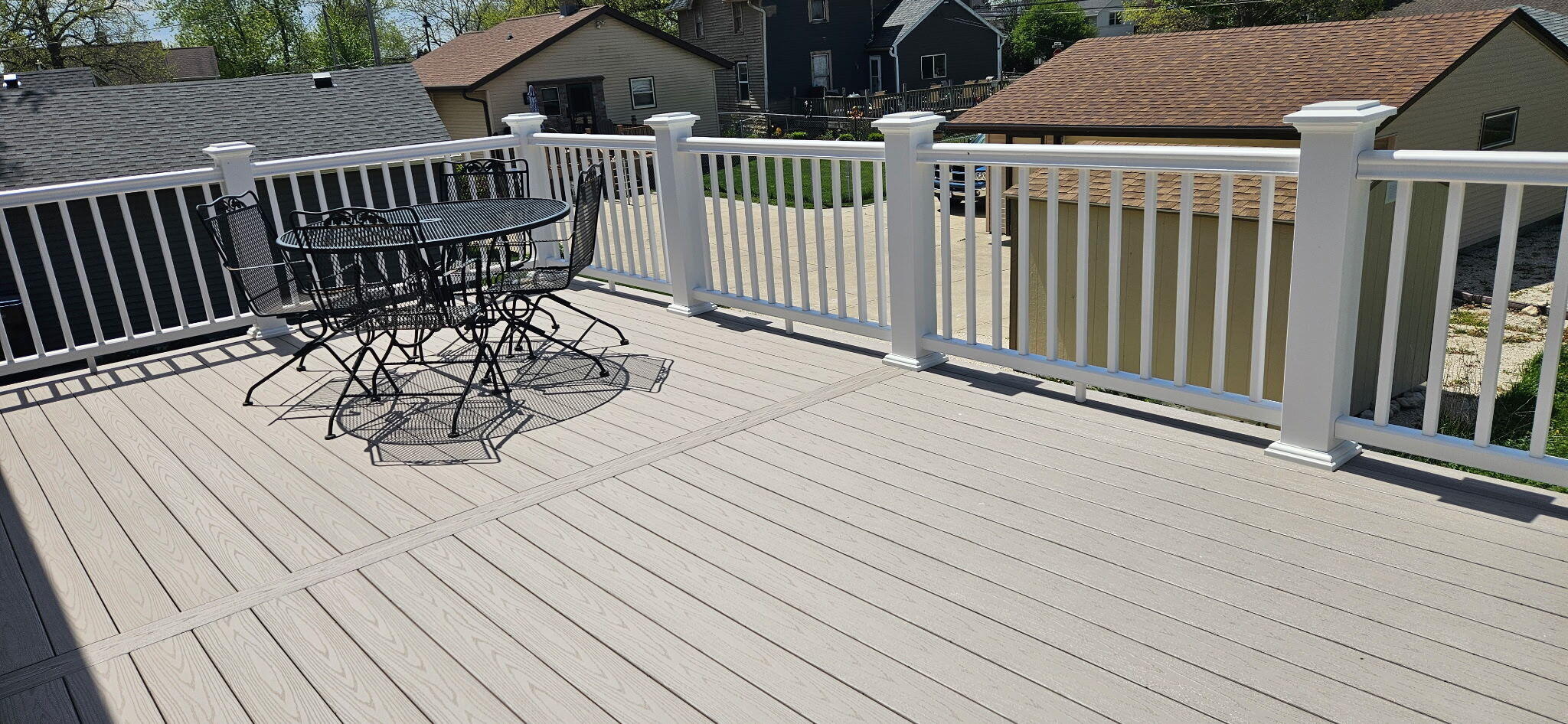 327 Sandy Circle Pewaukee, WI 53072 - Photo 23 of 40 Expanded Deck for Spacious Entertaining