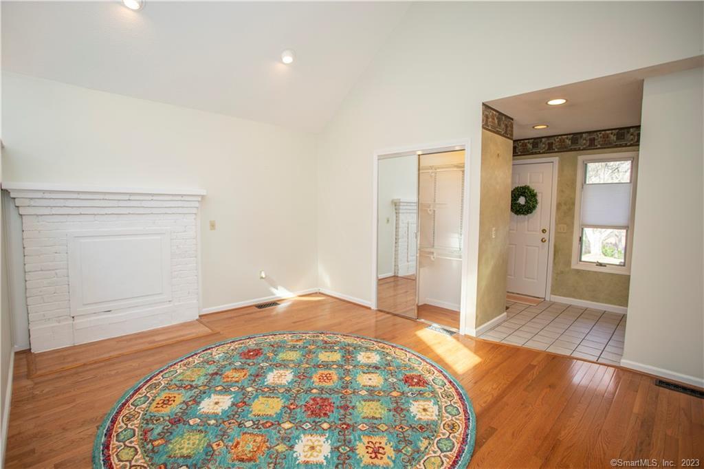 115 Ayers Point Road Old Saybrook, CT 06475 - Photo 25 of 34 wooden floor in an empty room with a window