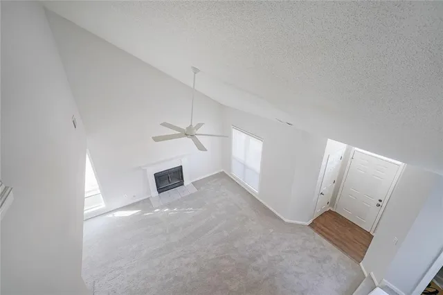 an entryway and ceiling fan in a room