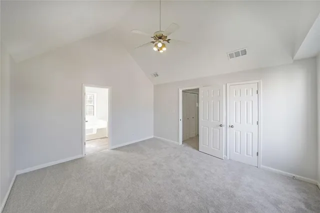 a view of a livingroom with a ceiling fan