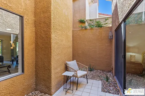 a view of a door and chair