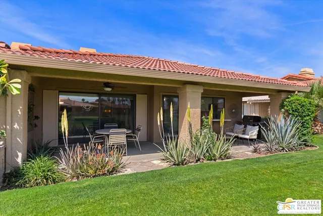 an aerial view of residential houses and outdoor space