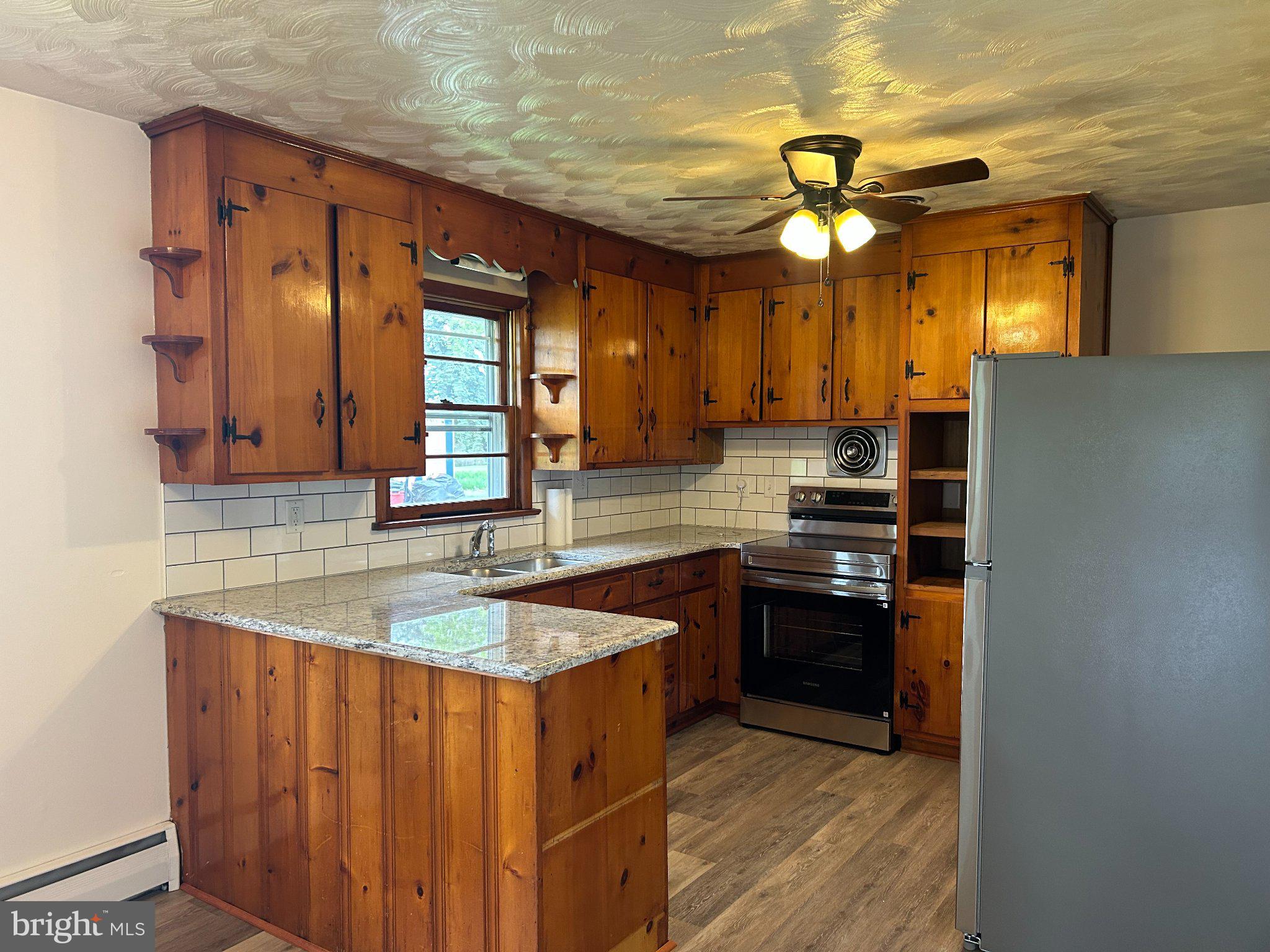 1968 Lehman Road Chambersburg, PA 17202 - Photo 25 of 28 Charming kitchen with rustic wood accents.