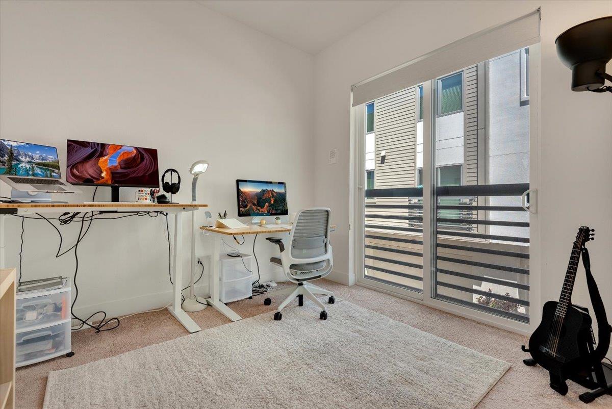 7961 Regional Common Dublin, CA 94568 - Photo 12 of 40 a view of a workspace with furniture and a window