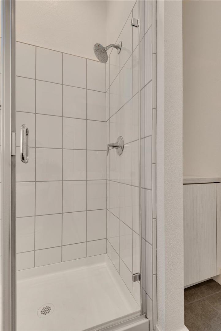 7961 Regional Common Dublin, CA 94568 - Photo 15 of 40 a bathroom with a bathtub