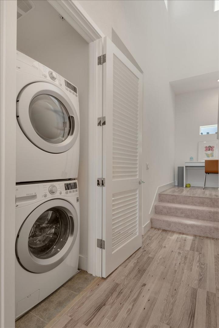 7961 Regional Common Dublin, CA 94568 - Photo 25 of 40 a view of a hallway with washer and dryer