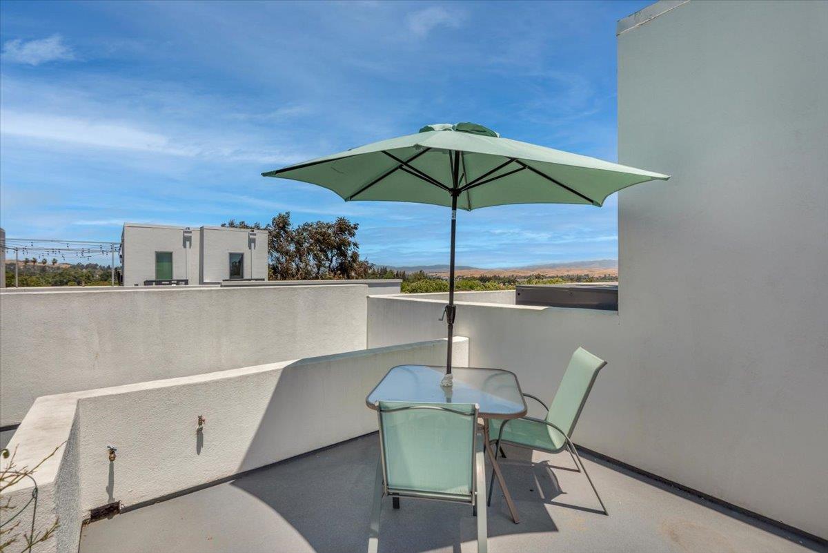 7961 Regional Common Dublin, CA 94568 - Photo 32 of 40 a view of a dining room with furniture and table