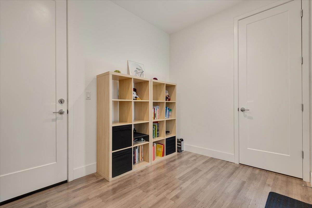 7961 Regional Common Dublin, CA 94568 - Photo 35 of 40 a view of a room with wooden floor and closet