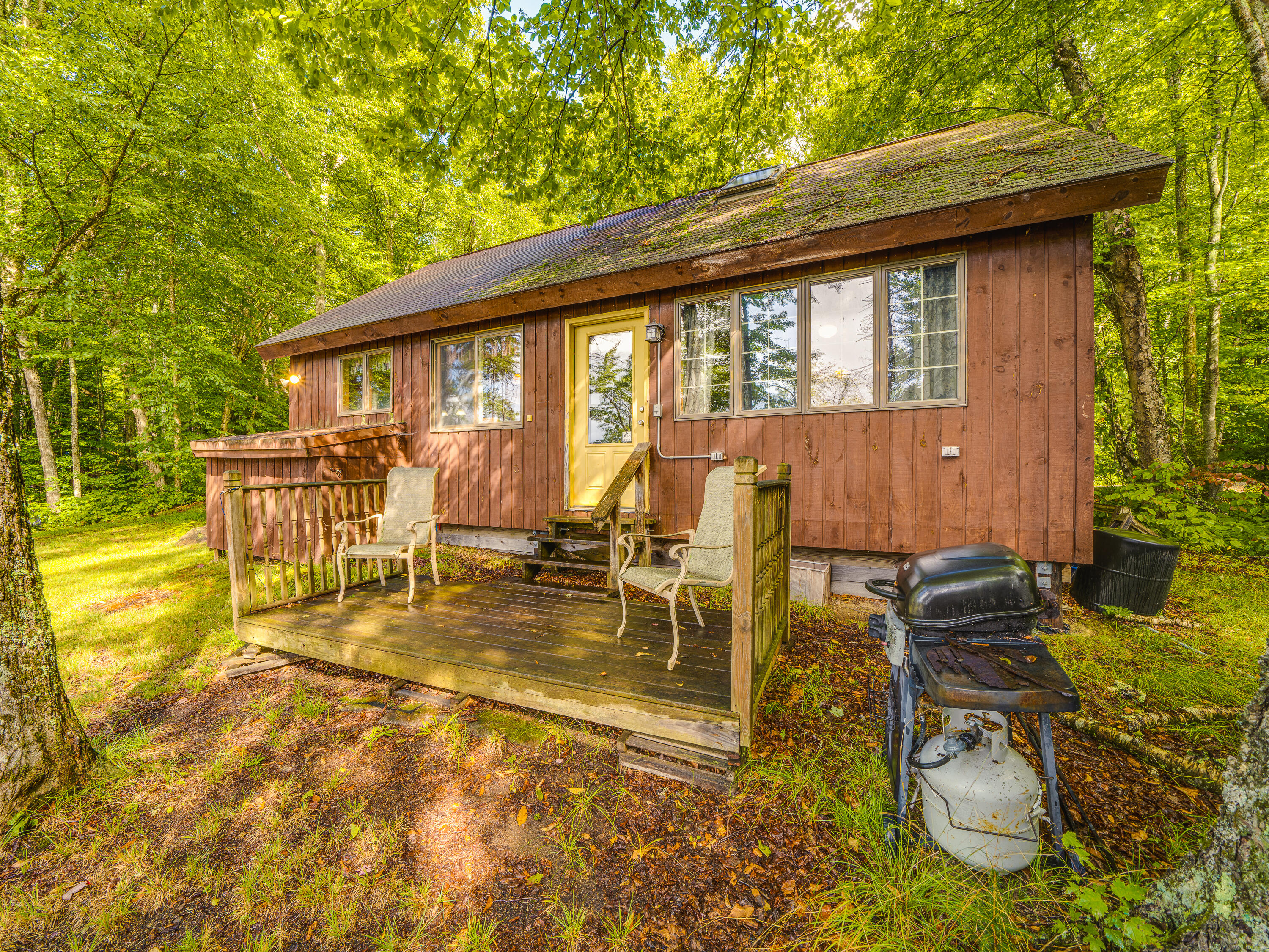 419 Woody's Road Newcomb, NY 12852 - Photo 7 of 37 Back deck of cabin