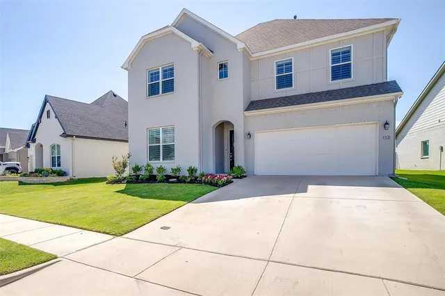 a front view of house with yard
