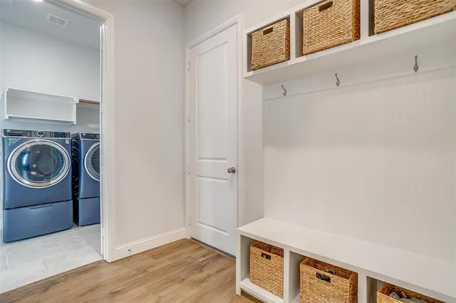 a utility room with dryer and washer