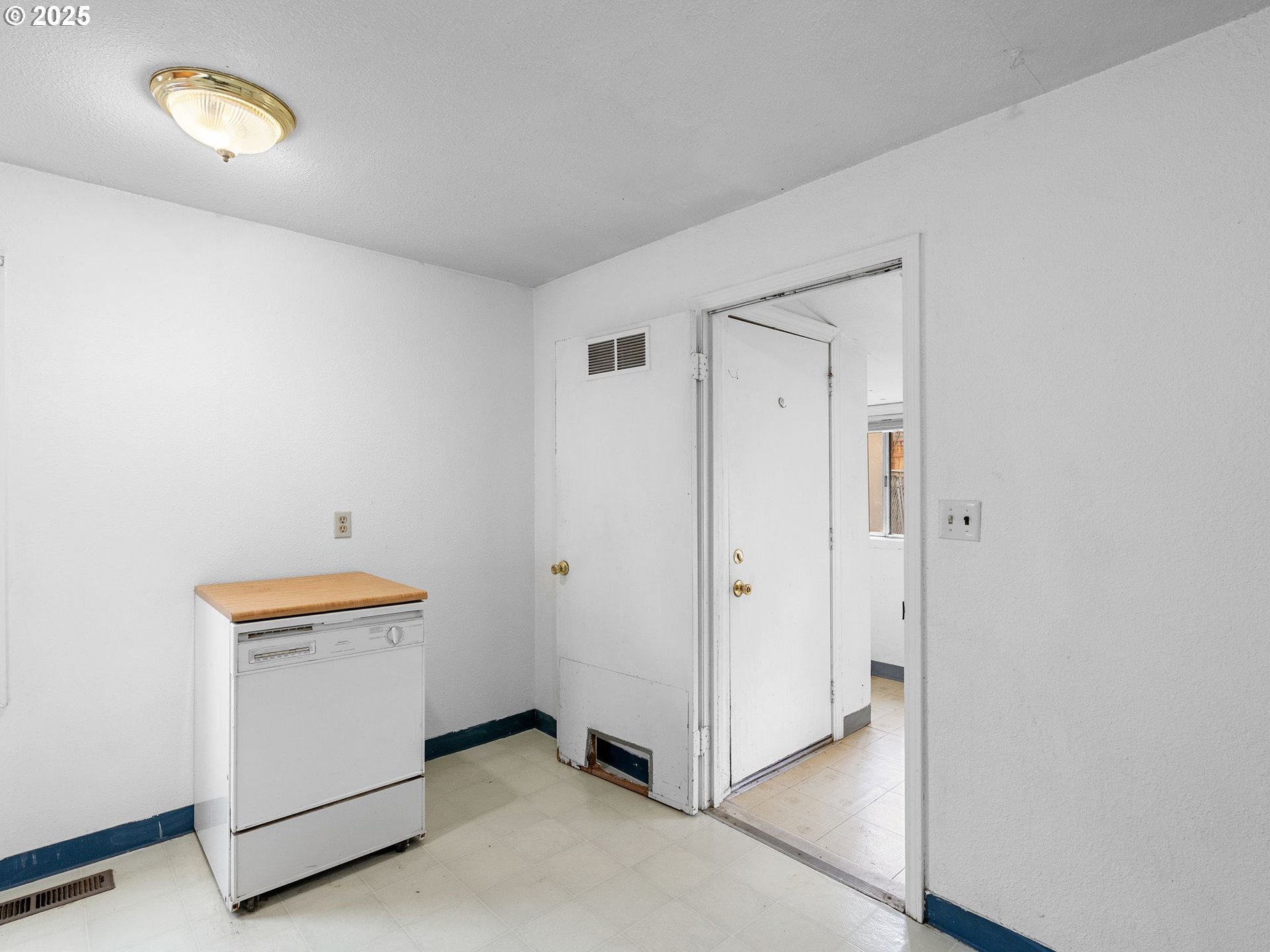 6009 Southeast 138th Place Portland, OR 97236 - Photo 18 of 37 a room with a dresser and mirror