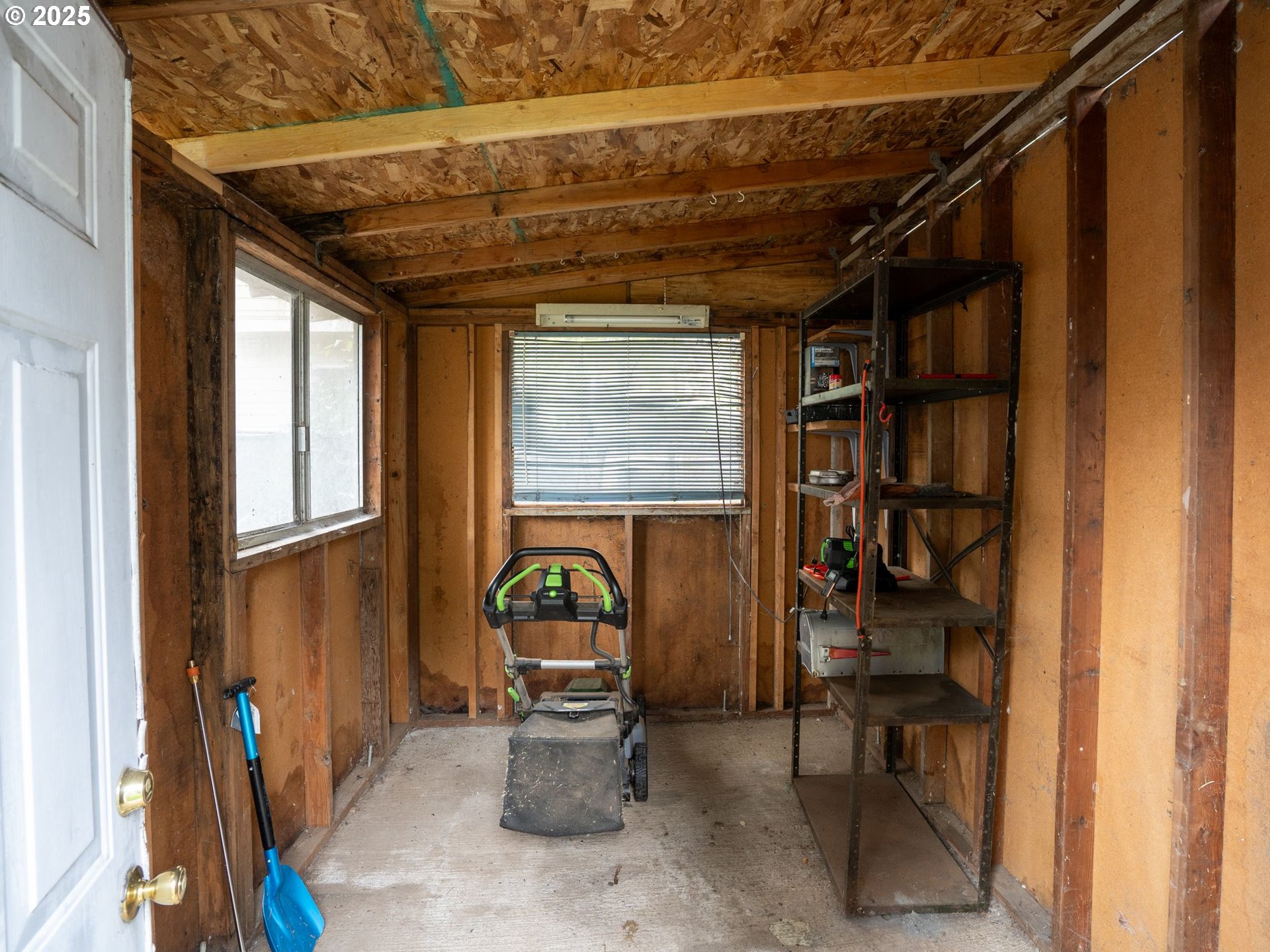 6009 Southeast 138th Place Portland, OR 97236 - Photo 24 of 37 a view of entryway with a wooden door