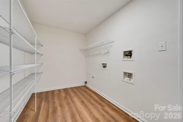 a view of a room with racks on the wall