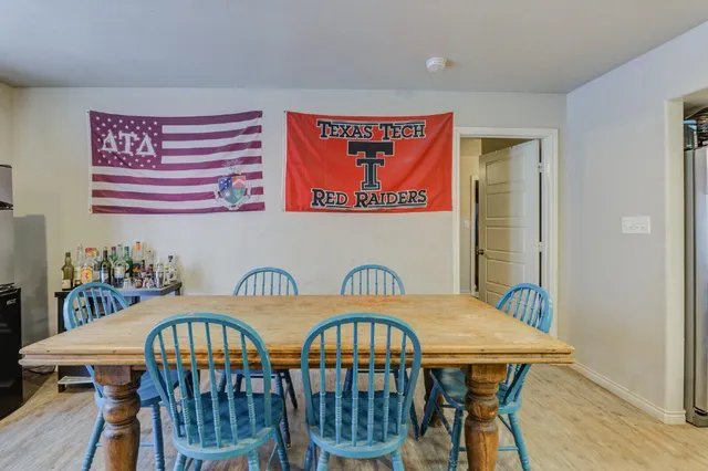 a view of a chairs and table in a room